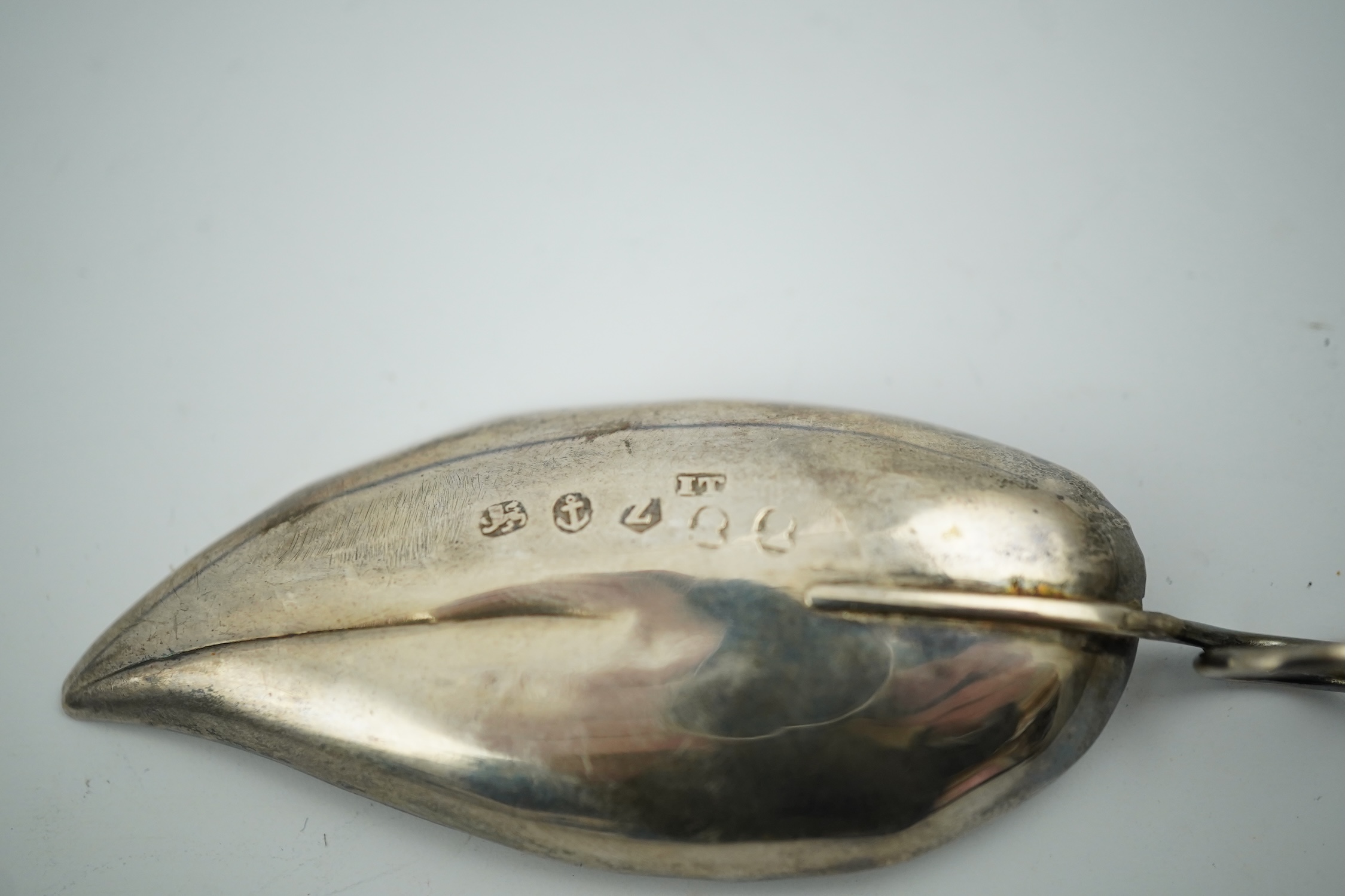 A George IV silver leaf shaped caddy spoon, maker I.T. Birmingham, 1823, 81mm. Condition - fair